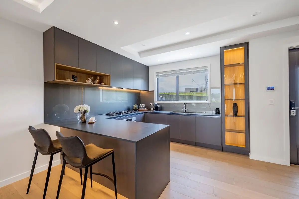 Kitchen with island bench and bar seating